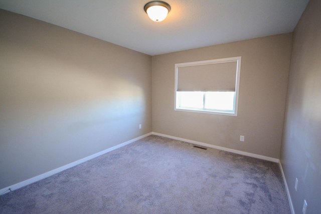 5656 Harvest Moon Blvd NW, Rochester, MN 55901 - carpeted spare room with baseboards