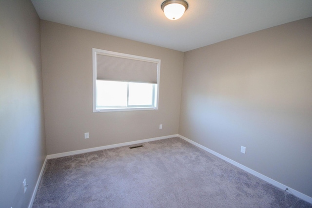 5656 Harvest Moon Blvd NW, Rochester, MN 55901 - carpeted empty room with baseboards