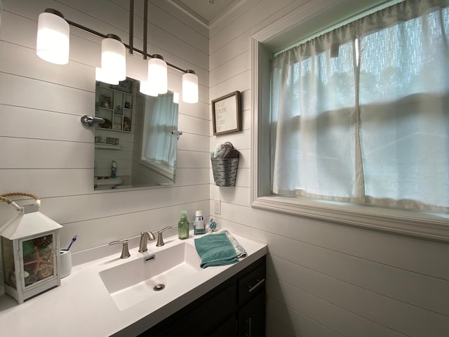 3771 County Line Rd, Moose Lake Twp, MN 55783 - bathroom with vanity and wooden walls