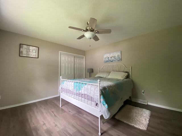 3771 County Line Rd, Moose Lake Twp, MN 55783 - bedroom with wood finished floors, baseboards, a closet, and ceiling fan