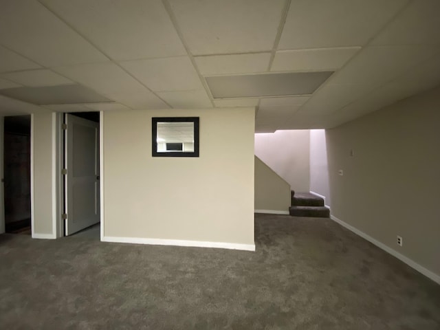 3771 County Line Rd, Moose Lake Twp, MN 55783 - finished basement featuring carpet, a paneled ceiling, baseboards, and stairs