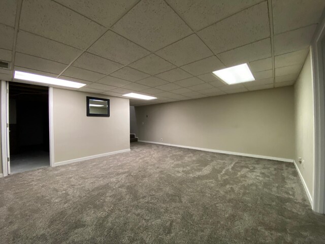 3771 County Line Rd, Moose Lake Twp, MN 55783 - finished basement featuring carpet floors, baseboards, and a paneled ceiling