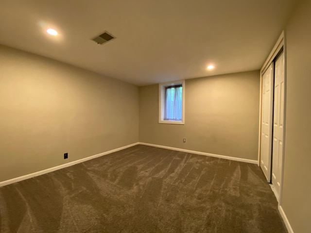 3771 County Line Rd, Moose Lake Twp, MN 55783 - unfurnished bedroom featuring dark carpet, baseboards, and recessed lighting