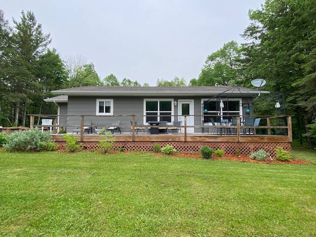 3771 County Line Rd, Moose Lake Twp, MN 55783 - rear view of house with a wooden deck and a lawn