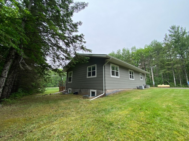 3771 County Line Rd, Moose Lake Twp, MN 55783 - view of side of home featuring a lawn
