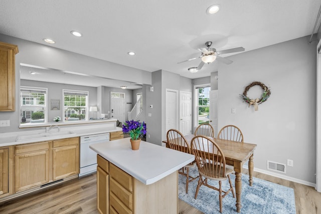 2099 Clover Ridge Dr, Chaska, MN 55318 - kitchen featuring dishwasher, a sink, light countertops, ceiling fan, and recessed lighting