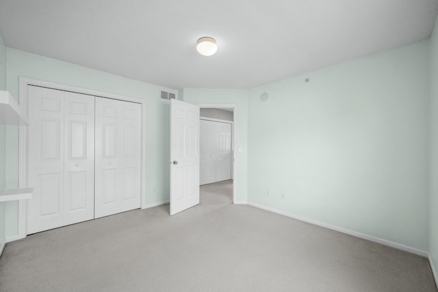 2099 Clover Ridge Dr, Chaska, MN 55318 - unfurnished bedroom with carpet, a closet, and baseboards