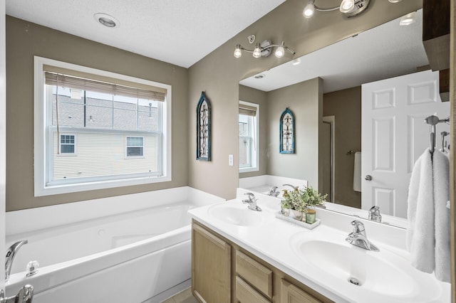 2099 Clover Ridge Dr, Chaska, MN 55318 - bathroom with a garden tub and double vanity