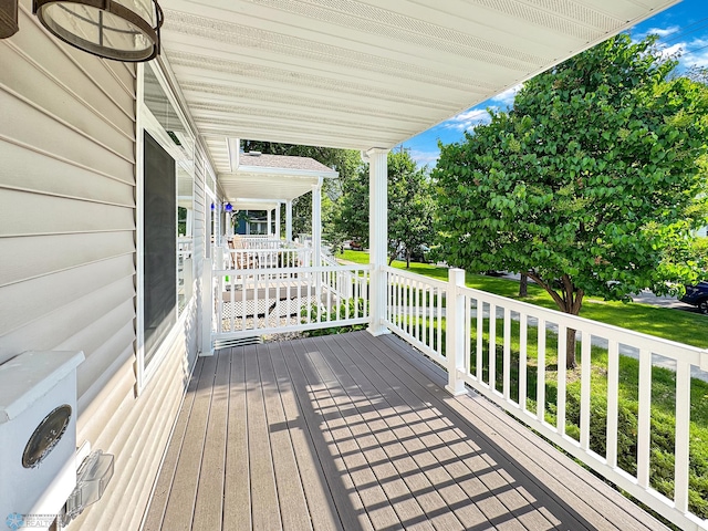 816 3rd St N Unit 816, Fargo, ND 58102 - wooden porch with a lawn