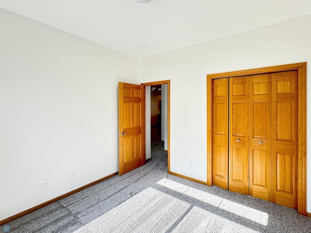 816 3rd St N Unit 816, Fargo, ND 58102 - unfurnished bedroom featuring carpet floors, baseboards, and a closet