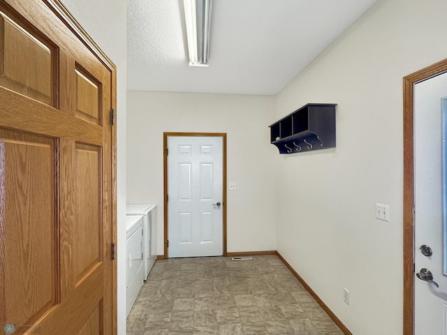 816 3rd St N Unit 816, Fargo, ND 58102 - laundry area featuring washer and clothes dryer and baseboards