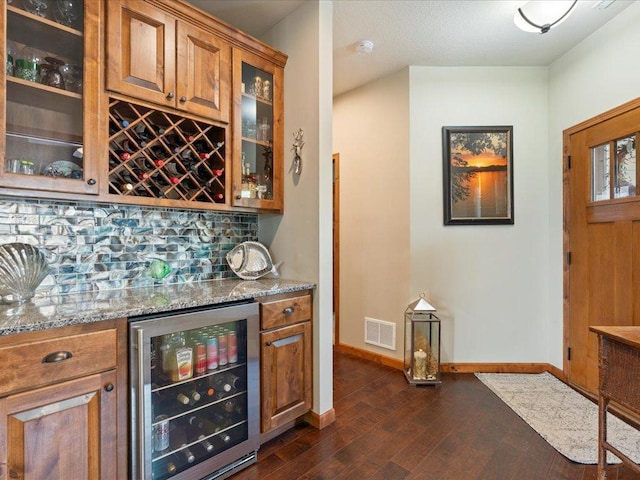 7496 Fairway Ln, Breezy Point, MN 56472 - indoor dry bar featuring wine cooler, dark wood-type flooring, and backsplash