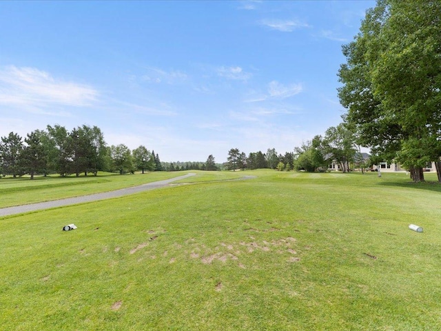 7496 Fairway Ln, Breezy Point, MN 56472 - view of community featuring a lawn and view of golf course