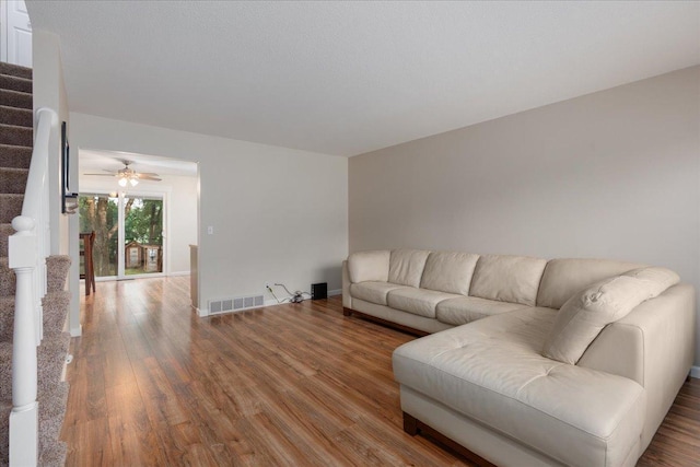 751 Sand Hill Pt, North Hudson, WI 54016 - living room with stairway, wood finished floors, baseboards, and a ceiling fan