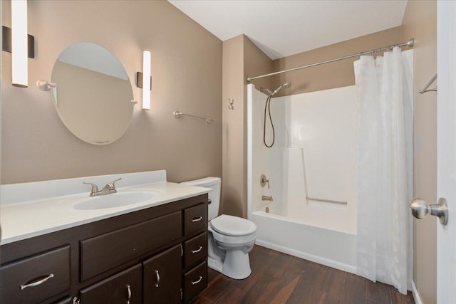 751 Sand Hill Pt, North Hudson, WI 54016 - bathroom with vanity, toilet, shower / bathtub combination with curtain, and wood finished floors