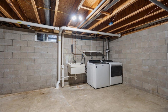 751 Sand Hill Pt, North Hudson, WI 54016 - unfinished basement with washer and clothes dryer and a sink