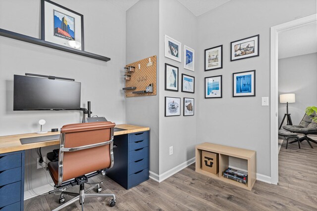 8756 Granite Ln, Woodbury, MN 55129 - office space with wood finished floors and baseboards