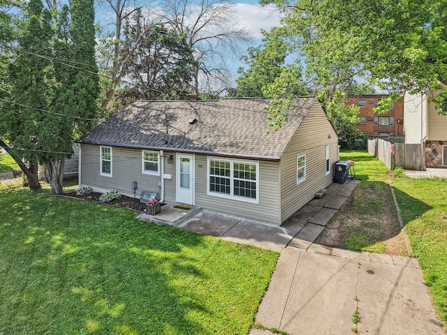 1524 Arlington Ave E, Saint Paul, MN 55106 - view of front of property featuring a shingled roof and a patio area