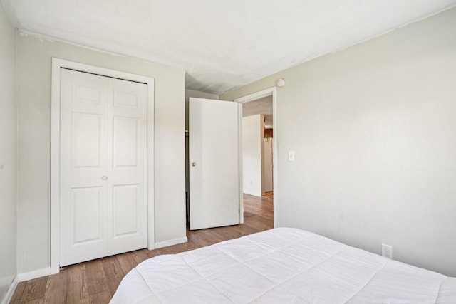 1524 Arlington Ave E, Saint Paul, MN 55106 - bedroom with wood finished floors and a closet