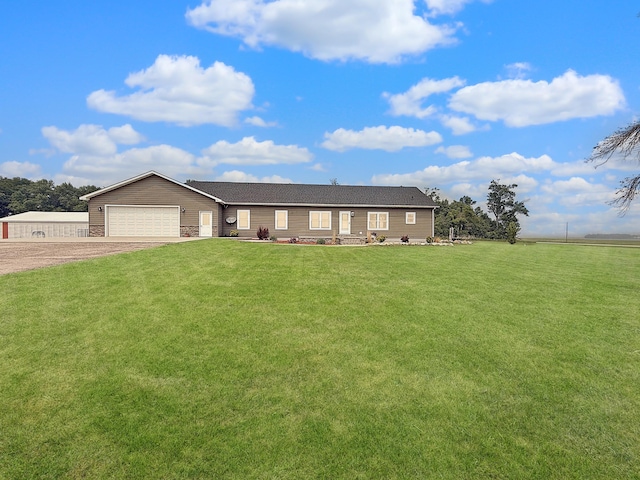 2771 271st Ave, Madison, MN 56256 - ranch-style home with driveway, a front yard, and a garage