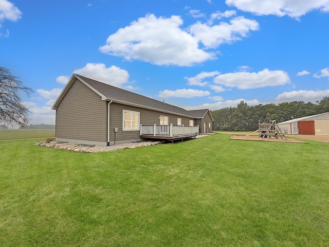 2771 271st Ave, Madison, MN 56256 - back of house featuring a deck and a lawn