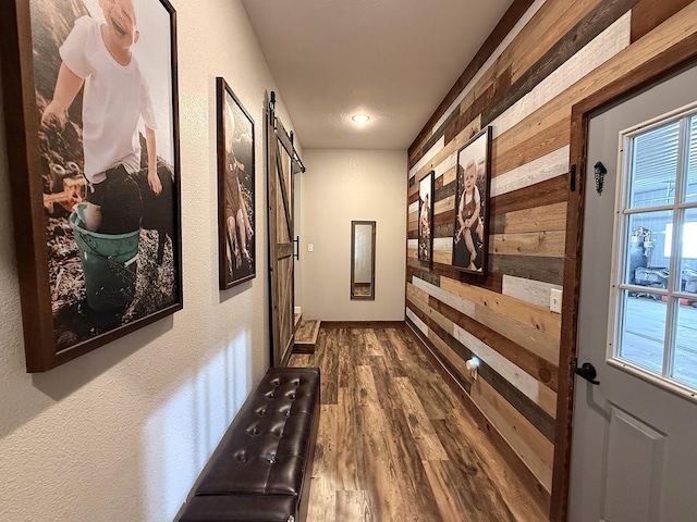 2771 271st Ave, Madison, MN 56256 - corridor with dark wood-style flooring, wood walls, and recessed lighting