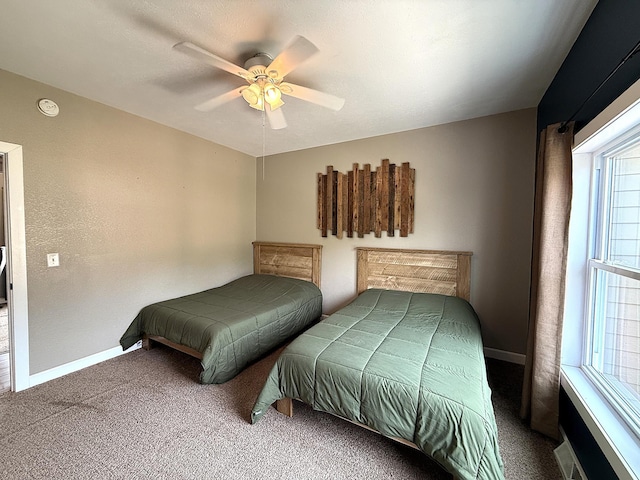 2771 271st Ave, Madison, MN 56256 - carpeted bedroom featuring baseboards and ceiling fan