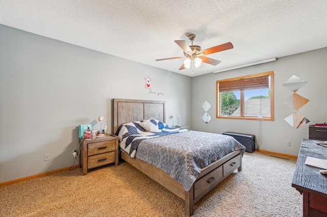 10344 Fox Run Rd, Woodbury, MN 55129 - bedroom featuring carpet, baseboards, a textured ceiling, and a ceiling fan