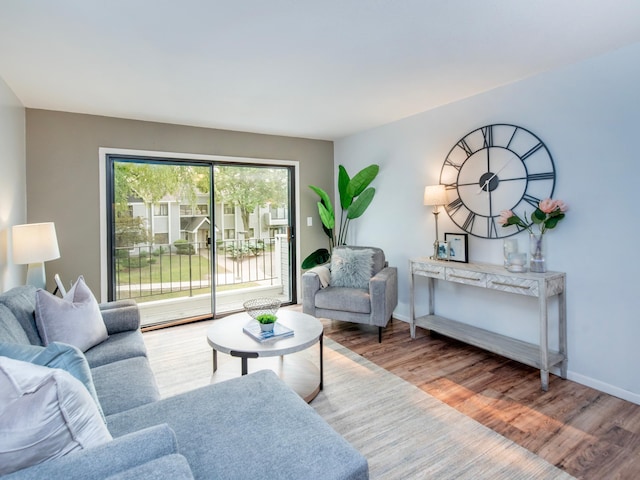 4010 52nd St Unit 204, Minneapolis, MN 55417 - living room featuring wood finished floors and baseboards