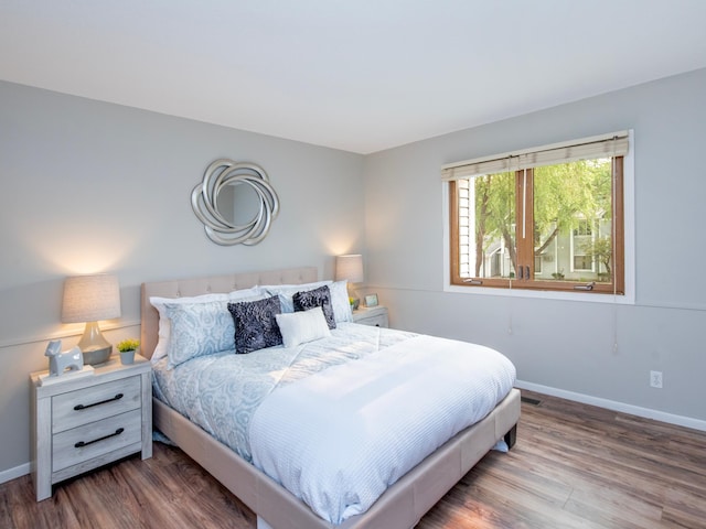 4010 52nd St Unit 204, Minneapolis, MN 55417 - bedroom with baseboards and wood finished floors