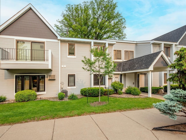 4010 52nd St Unit 204, Minneapolis, MN 55417 - view of building exterior featuring central AC and a wall mounted air conditioner