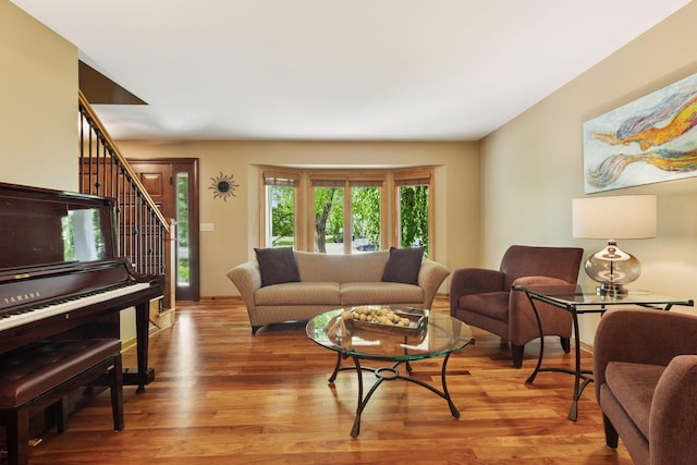 5921 Creek Pt, Minnetonka, MN 55345 - living room featuring stairway and light wood-type flooring