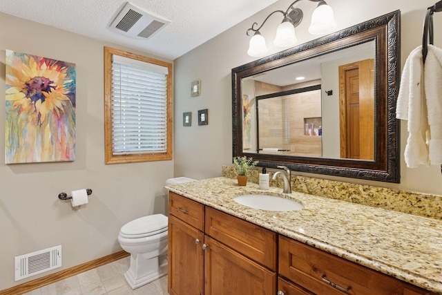 5921 Creek Pt, Minnetonka, MN 55345 - bathroom with vanity, toilet, a stall shower, baseboards, and a textured ceiling