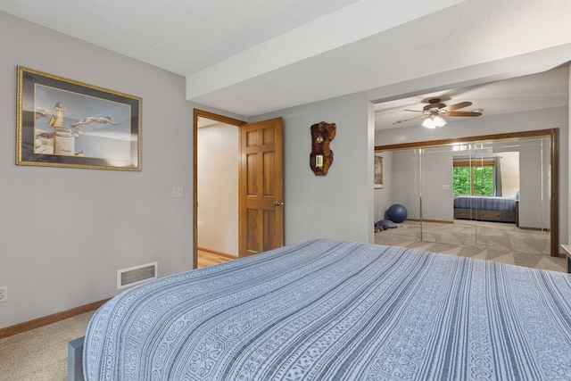 5921 Creek Pt, Minnetonka, MN 55345 - bedroom with carpet flooring, baseboards, a closet, and ceiling fan
