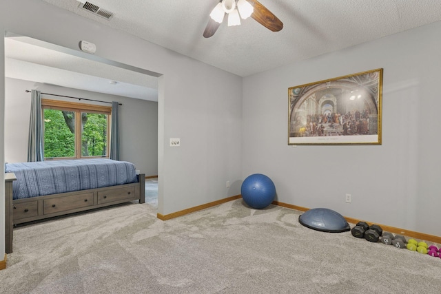 5921 Creek Pt, Minnetonka, MN 55345 - bedroom featuring carpet floors, baseboards, a textured ceiling, and ceiling fan