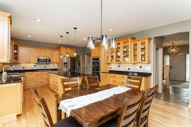 2292 Teakwood Ln SW, Rochester, MN 55902 - dining space with light wood-style flooring and recessed lighting