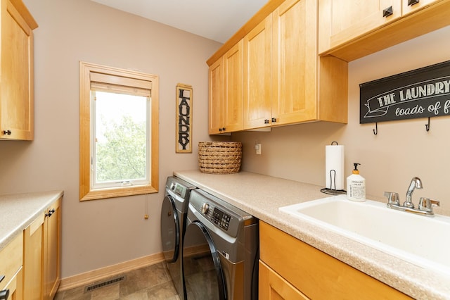 2292 Teakwood Ln SW, Rochester, MN 55902 - laundry room with cabinet space, independent washer and dryer, and baseboards