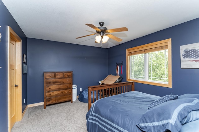 2292 Teakwood Ln SW, Rochester, MN 55902 - bedroom featuring carpet, a ceiling fan, and baseboards