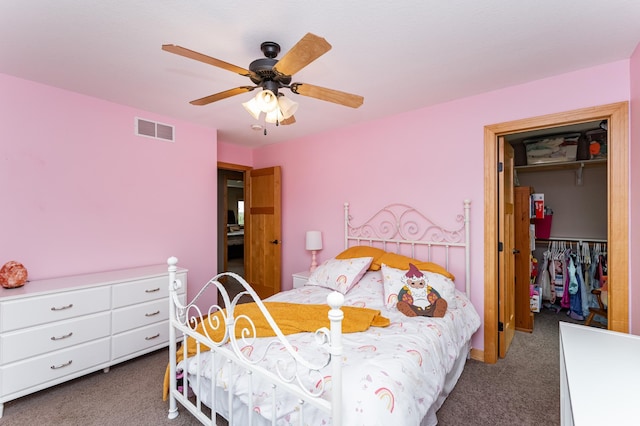 2292 Teakwood Ln SW, Rochester, MN 55902 - carpeted bedroom with a closet, a spacious closet, and a ceiling fan