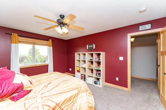 2292 Teakwood Ln SW, Rochester, MN 55902 - carpeted bedroom with baseboards and ceiling fan