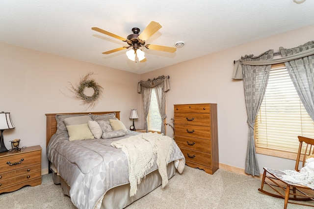 2292 Teakwood Ln SW, Rochester, MN 55902 - carpeted bedroom with ceiling fan and baseboards