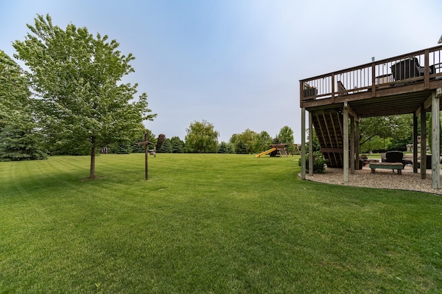 2292 Teakwood Ln SW, Rochester, MN 55902 - view of green lawn featuring a deck and a playground