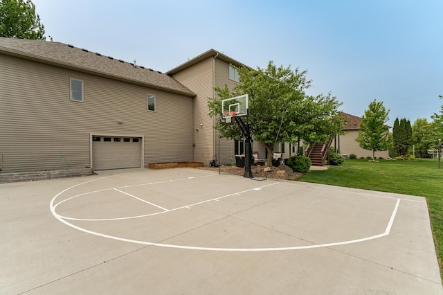 2292 Teakwood Ln SW, Rochester, MN 55902 - view of basketball court with basketball court, a lawn, and stairs
