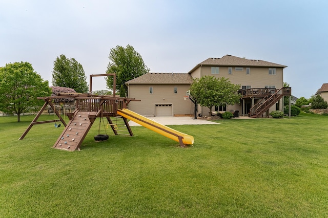 2292 Teakwood Ln SW, Rochester, MN 55902 - view of playground featuring stairs, a wooden deck, and a lawn