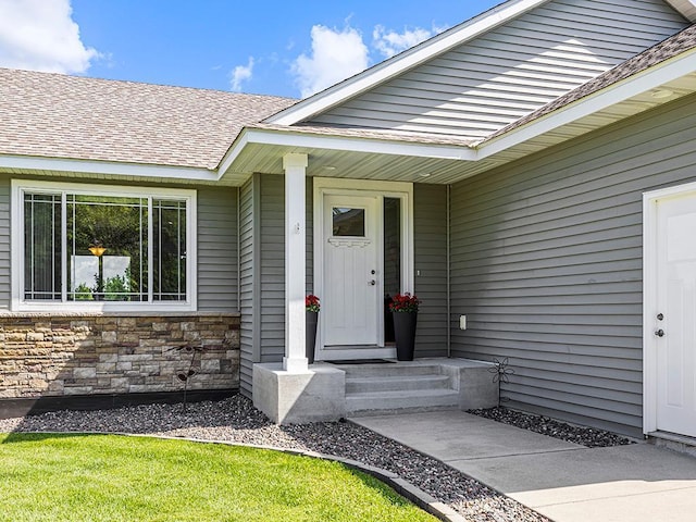 1308 Timber Ln, Buffalo, MN 55313 - entrance to property featuring a shingled roof and stone siding
