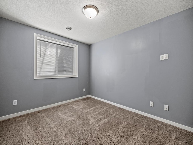 1308 Timber Ln, Buffalo, MN 55313 - carpeted empty room featuring a textured ceiling and baseboards