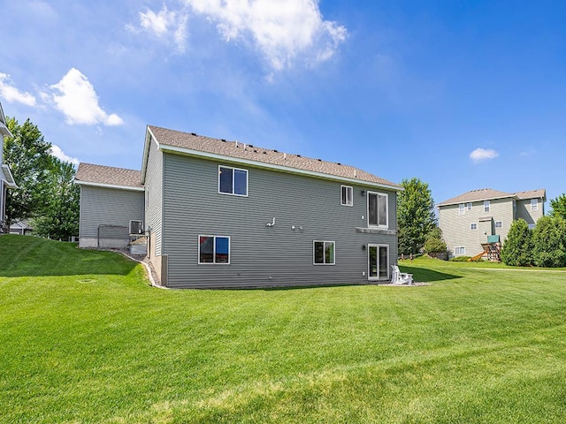 1308 Timber Ln, Buffalo, MN 55313 - rear view of house with a yard