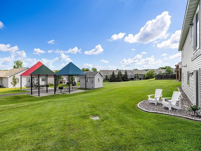 1308 Timber Ln, Buffalo, MN 55313 - view of green lawn with a gazebo, a residential view, an outbuilding, and a patio area