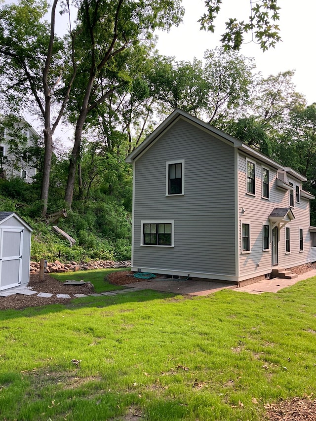 112 Harriet St S, Stillwater, MN 55082 - back of property with a lawn, a patio area, and entry steps