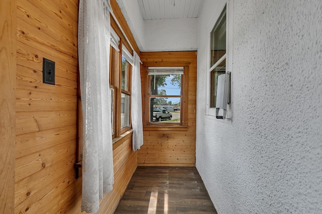 607 23rd Ave N, Saint Cloud, MN 56303 - hall with dark wood-style flooring and wooden walls